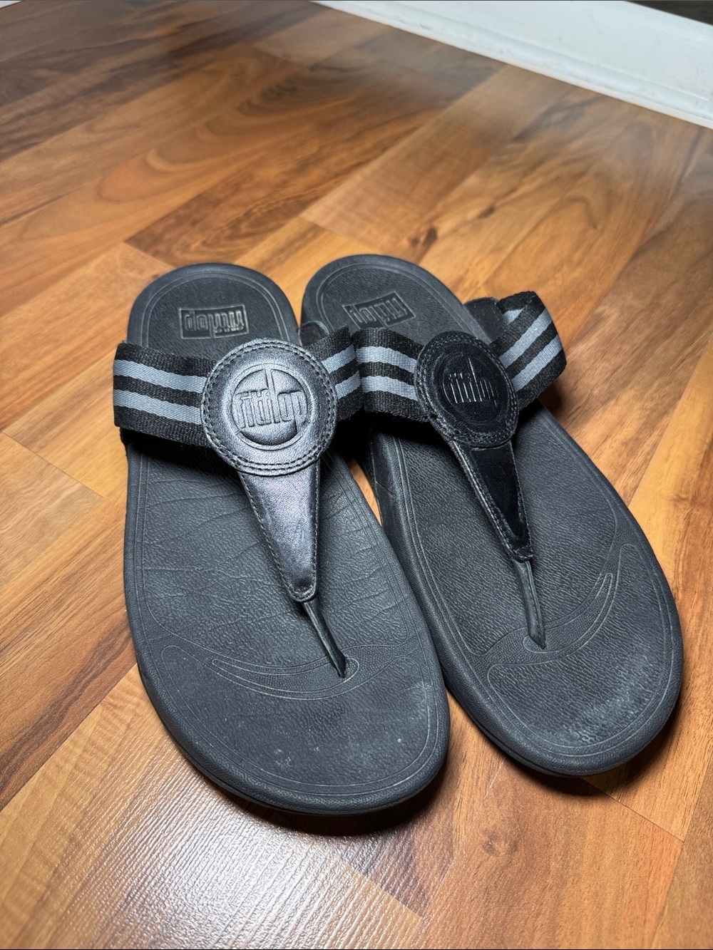 Fitflop Black Thong Sandals with Gray Striped Fabric Strap